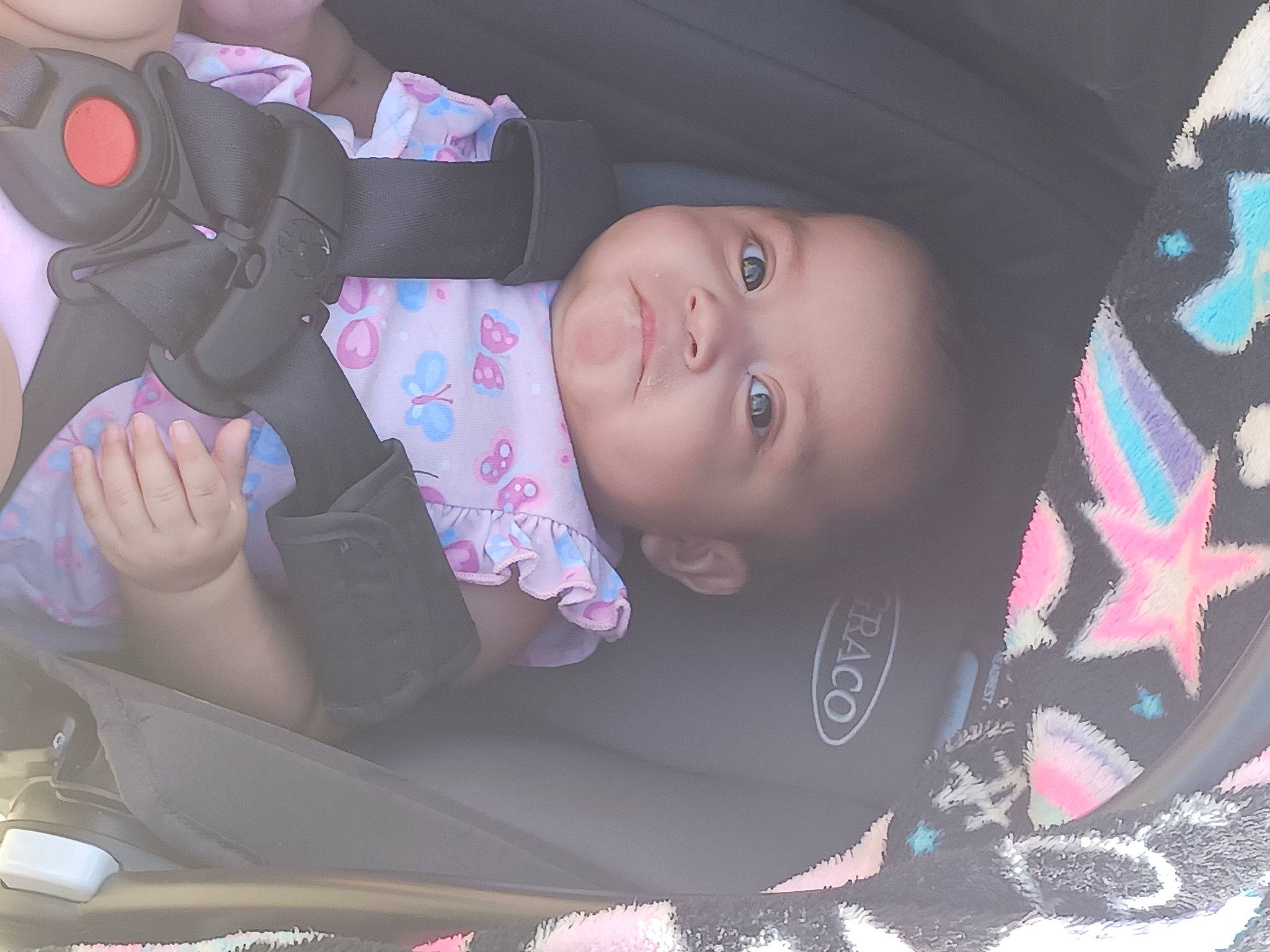 Ariah joined the competition — help win amazing prizes! baby, baby_toddler_clothing, car_seat, cheek, child, comfort, cool, facial_expression, fun, human, lip, mouth, people, person, pink, product, purple, skin, smile, toddler