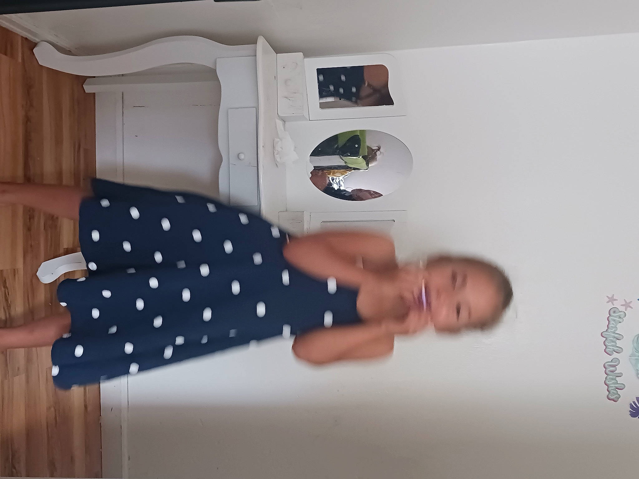 Leilani is registered to the contest to win money with this photo: elbow, gesture, linens, one_piece_garment, pattern, person, polka_dot, room, sleeve, wrist