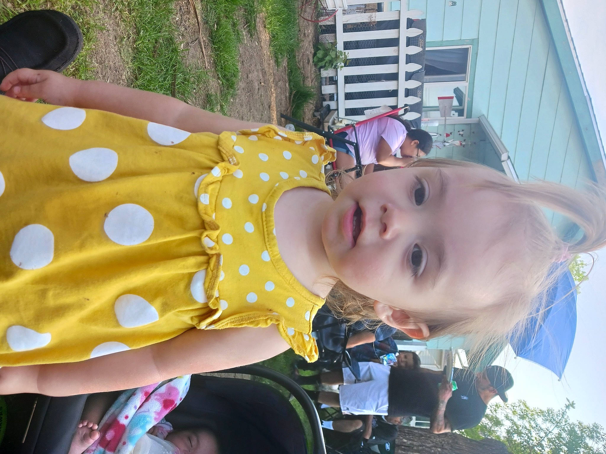 Neveah joined the competition — help win amazing prizes! baby, baby_products, baby_toddler_clothing, building, child, event, fun, grass, happy, hat, house, leisure, pattern, person, sky, smile, sun_hat, toddler, tree, white