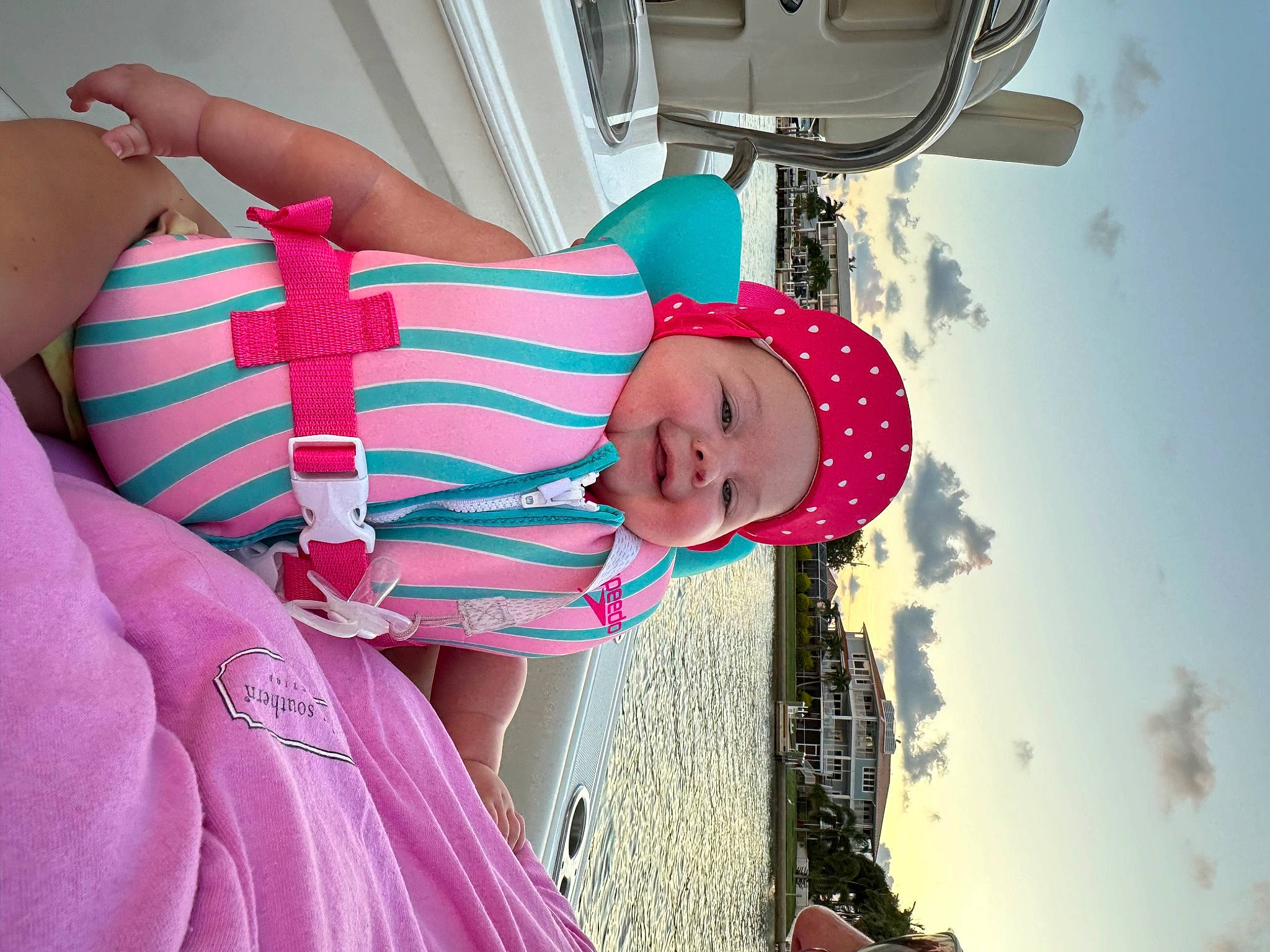 Lakelynn is registered to the contest to win money with this photo: child, cloud, couch, fashion_accessory, fun, happy, hat, headwear, leisure, magenta, pattern, person, photography, pink, sky, smile, sun_hat, toddler, travel, vacation
