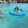 Jackson joined the competition — help win amazing prizes! baby, child, pool, water, inflatable_ring, blue_hat, swimming_pool, sunny, outdoor, people, relaxing, summer, fun, vacation, family, float, water_fun, leisure, sun_protection, happy