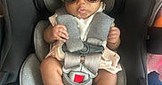 Nova joined the competition — help win amazing prizes! baby, child, car_seat, sunglasses, headband, bow, pucker, infant, cute, fashion, seatbelt, clothing, footwear, indoors, person, baby_shoes, straps, safety, adorable, portrait