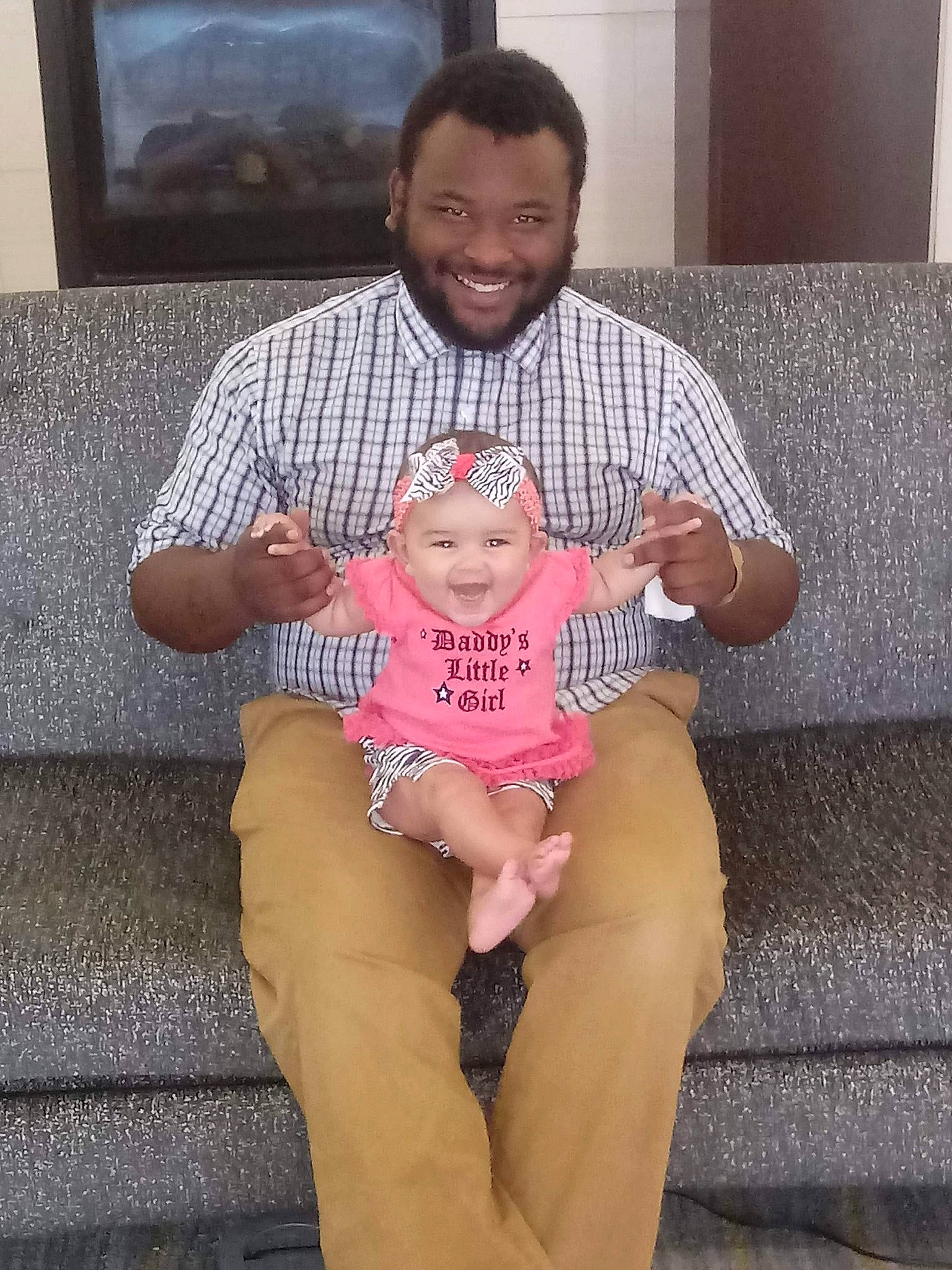 Lillyana joined the competition — help win amazing prizes! baby, child, daughter, family, father, fun, grandparent, joy, lap, leg, people, person, sitting, skin, smile, t_shirt, thigh, toddler