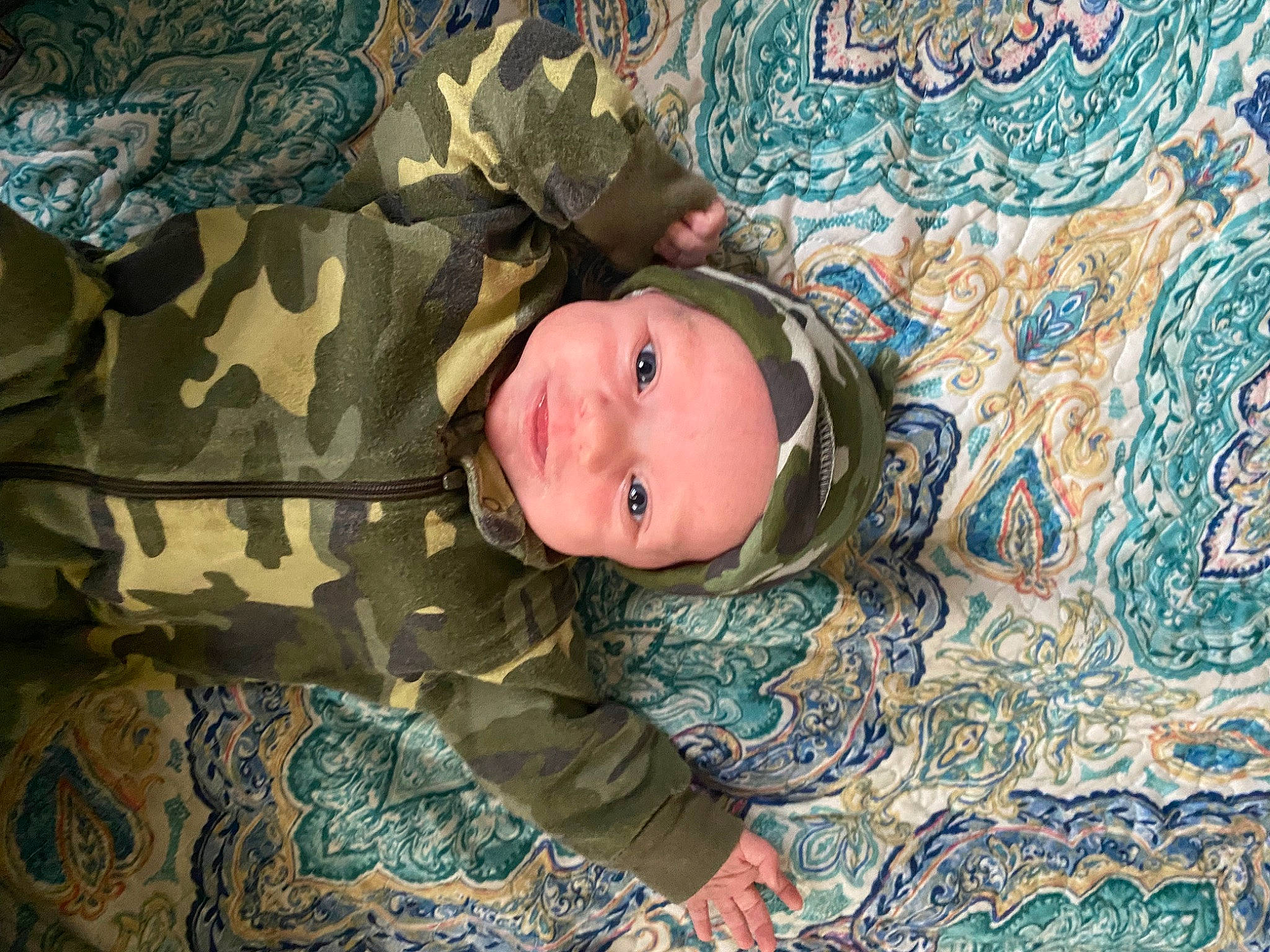 Keegan joined the competition — help win amazing prizes! camouflage, child, comfort, eye, face, fun, fur, happy, head, headwear, linens, military, military_camouflage, military_person, military_uniform, pattern, person, sleeve, smile, toddler