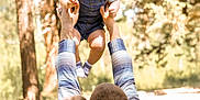 Bentley joined the competition — help win amazing prizes! toddler, child, man, woman, family, outdoor, forest, trees, sunlight, smile, happy, denim_overalls, plaid_shirt, blonde_hair, grass, nature, parent, holding, playing, joy