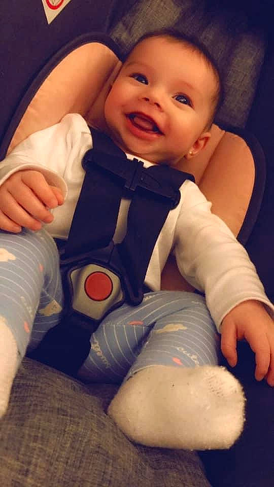 Aniyaah joined the competition — help win amazing prizes! baby, baby_toddler_clothing, cheek, comfort, eye, face, facial_expression, finger, flash_photography, happy, joint, knee, leg, mouth, nose, orange, person, skin, sleeve, smile