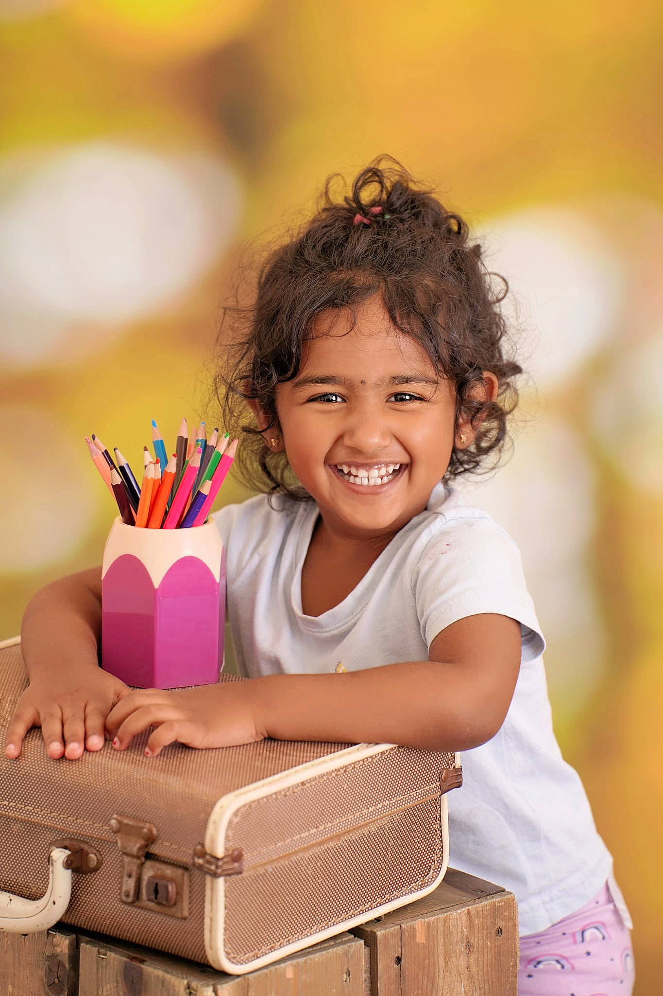 Mireya is registered to the contest to win money with this photo: beauty, box, child, dress, facial_expression, flash_photography, fun, hairstyle, happy, human, joy, leisure, people_in_nature, person, recreation, sitting, skin, smile, stock_photography, toddler