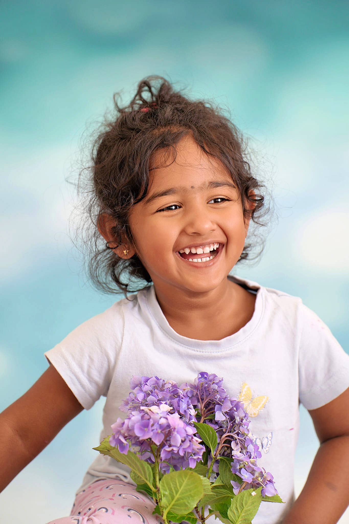 Mireya is registered to the contest to win money with this photo: annual_plant, child, close_up, cut_flowers, face, flash_photography, flower, flower_arranging, flowering_plant, grass, happy, iris, joy, magenta, people_in_nature, person, petal, plant, sky, smile