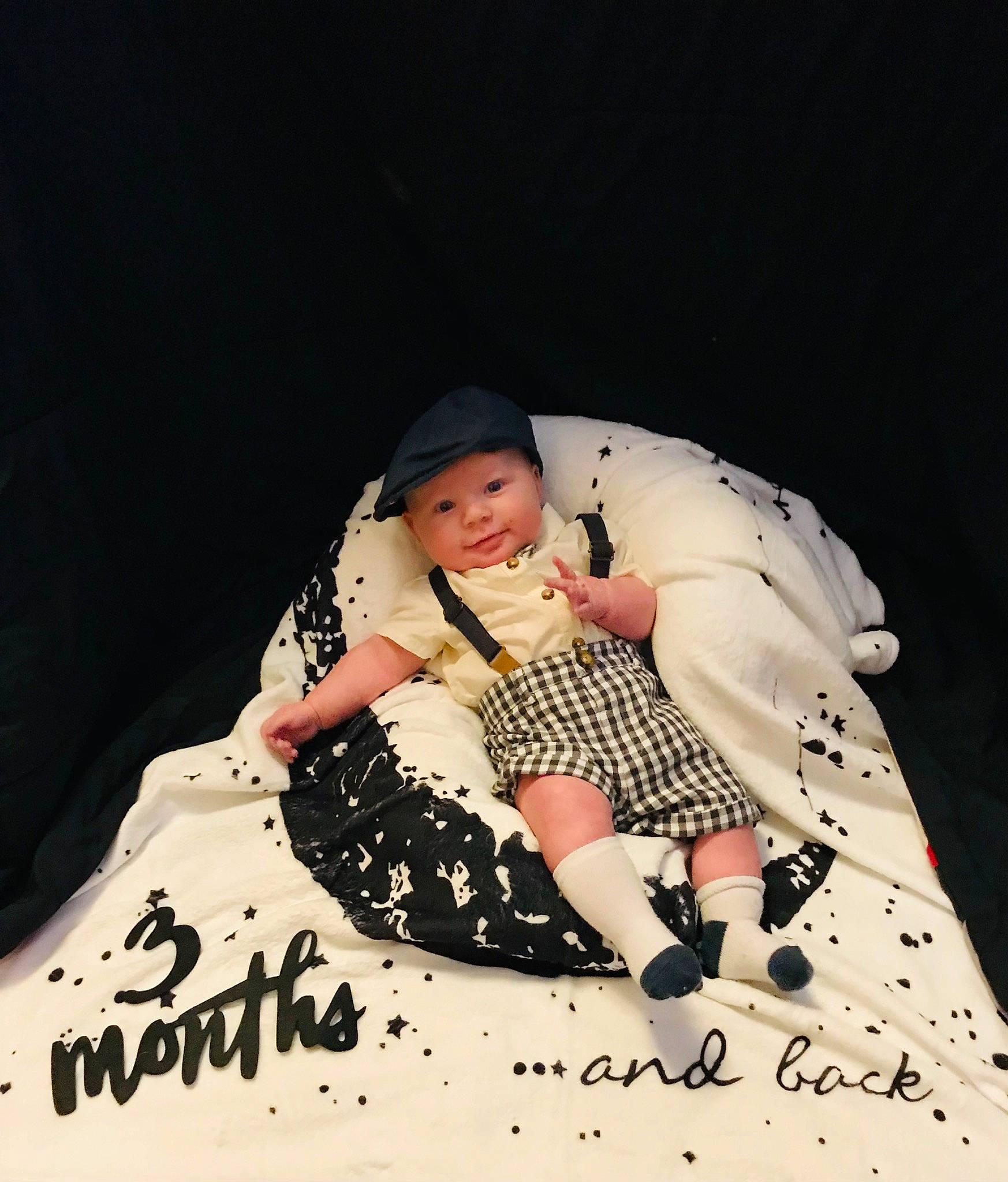 Jenson is registered to the contest to win money with this photo: cap, carmine, comfort, darkness, event, fashion_design, flash_photography, font, fun, headwear, human_leg, knee, nail, pattern, person, recreation, sitting, sleeve, sugar_cake, thigh