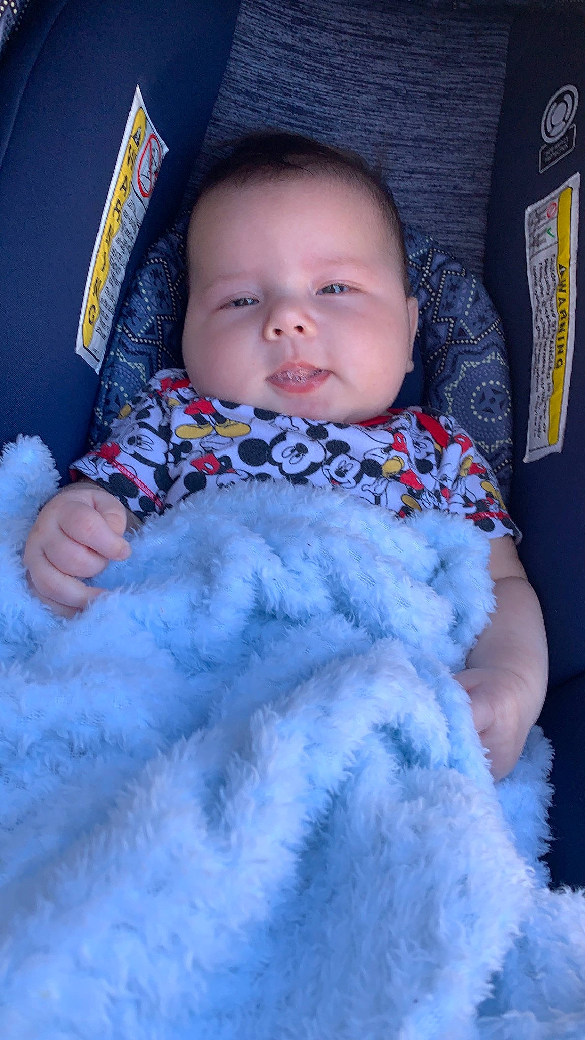 Geovonii is registered to the contest to win money with this photo: azure, baby, baby_toddler_clothing, blue, cheek, chin, comfort, eye, face, head, iris, lip, mouth, nose, person, purple, skin, sleeve, smile, textile