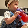 Aurora joined the competition — help win amazing prizes! baby, bow, child, clothing, cute, denim_dress, face, foot, hair, hands, headband, indoor, infant, person, profile, red_drink, sippy_cup, sitting, skin, soft_focus