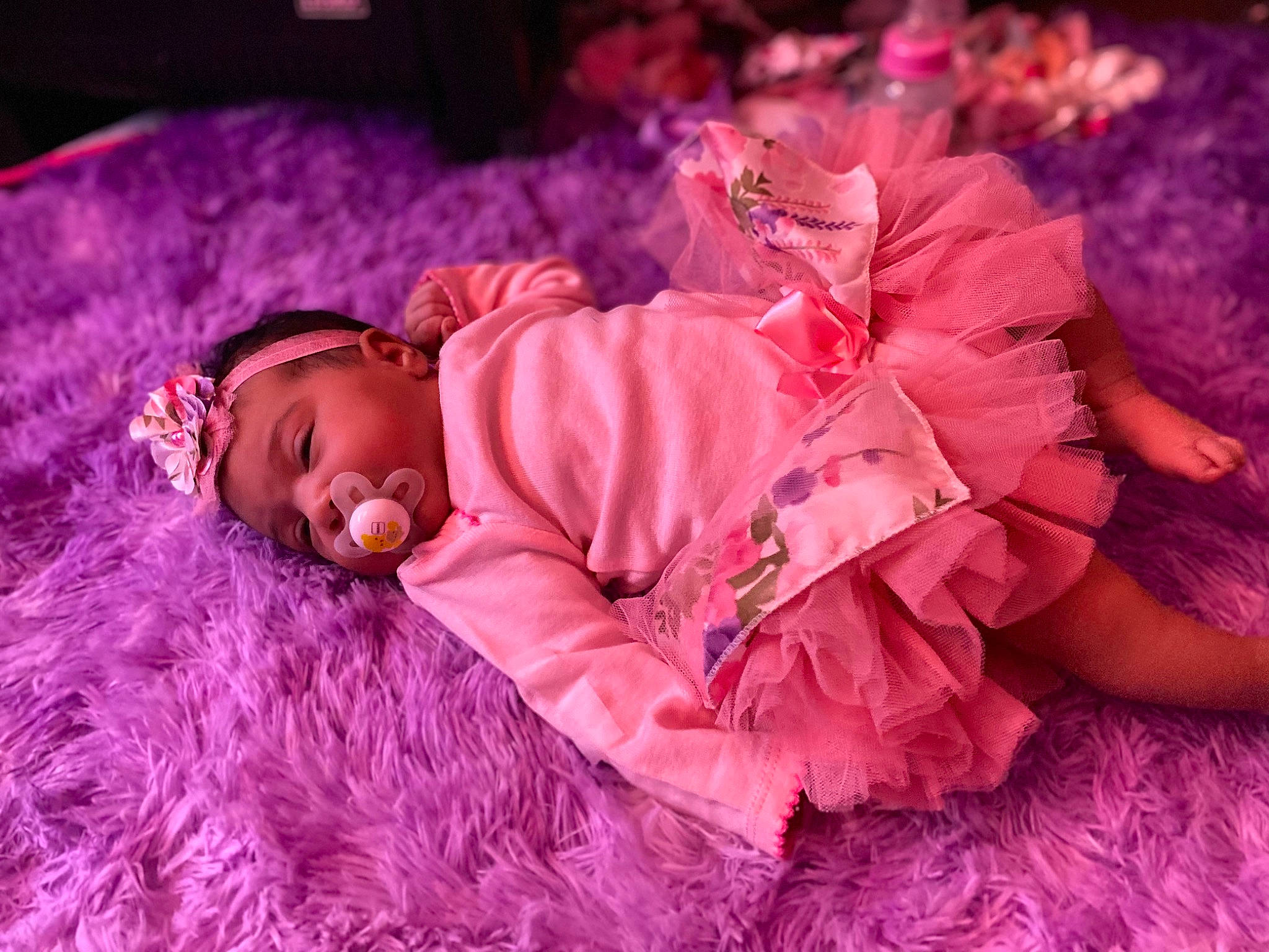 Maya joined the competition — help win amazing prizes! baby, baby_toddler_clothing, child, costume, entertainment, event, flower, fun, fur, grass, happy, magenta, peach, person, petal, pink, plant, purple, toddler, tradition