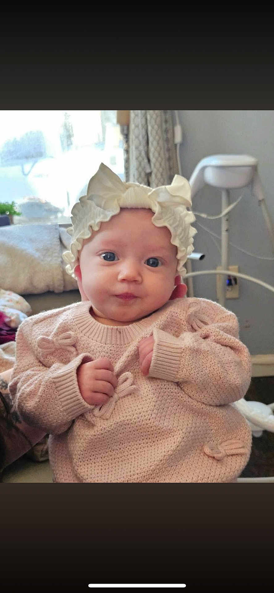 Yazmin joined the competition — help win amazing prizes! baby, infant, child, clothing, sweater, bonnet, headwear, indoor, portrait, cute, person, knitted, pink, face, hands, seated, cozy, furniture, blanket, baby_chair