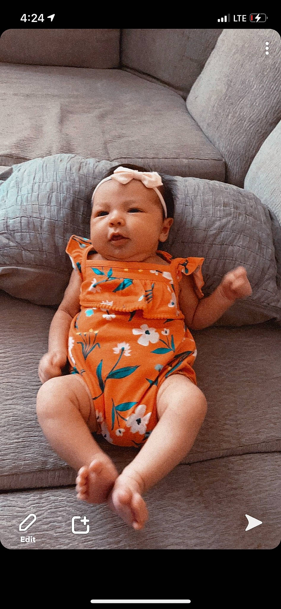 Avery joined the competition — help win amazing prizes! abdomen, baby, baby_toddler_clothing, barefoot, cheek, child, comfort, couch, foot, headwear, human_body, human_leg, knee, lap, pattern, person, sitting, skin, stomach, thigh