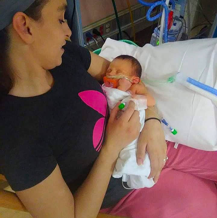 Kingston is registered to the contest to win money with this photo: baby, birth, child, daughter, ear, finger, mother, mouth, neck, person, skin, toddler