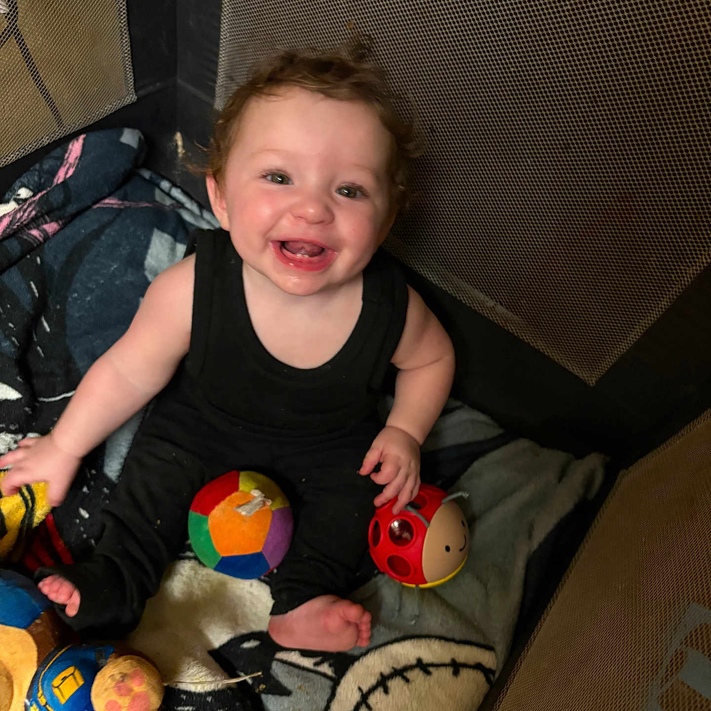 Cattleya is registered to the contest to win money with this photo: baby, ball, bodypart, clothing, couch, face, finger, football, furniture, hand, head, homedecor, person, photography, portrait, soccer, soccerball, sphere, sport, toy