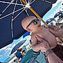 Silas joined the competition — help win amazing prizes! baby, sunglasses, beach, umbrella, summer, child, smiling, happy, person, outdoor, sky, clouds, people, vacation, sunshine, sand, holding_hands, fun, relaxation, family