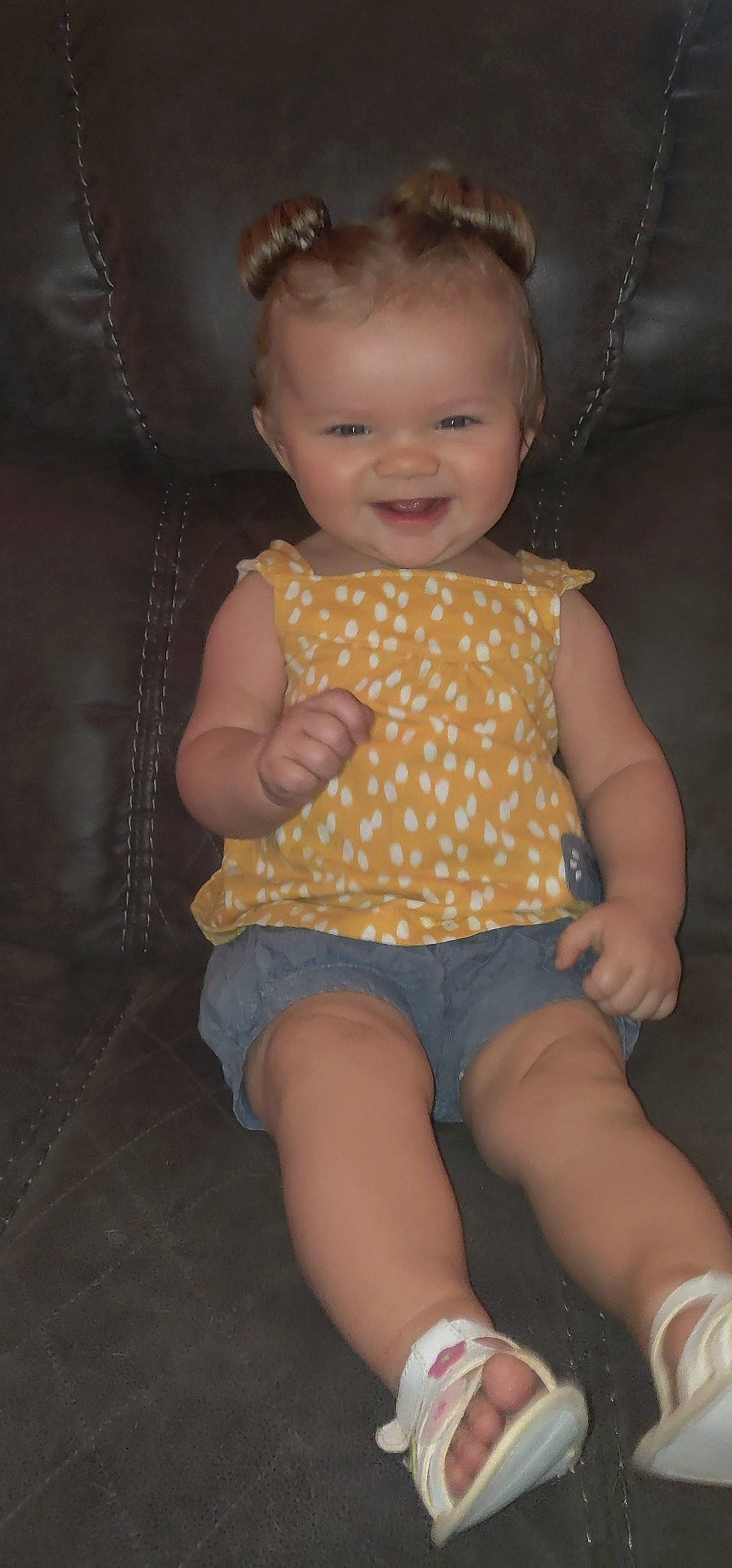 Paizlee is registered to the contest to win money with this photo: baby_toddler_clothing, cheek, chin, eye, face, facial_expression, finger, hair, hairstyle, head, iris, joy, leg, mouth, neck, person, pink, shorts, skin, sleeve