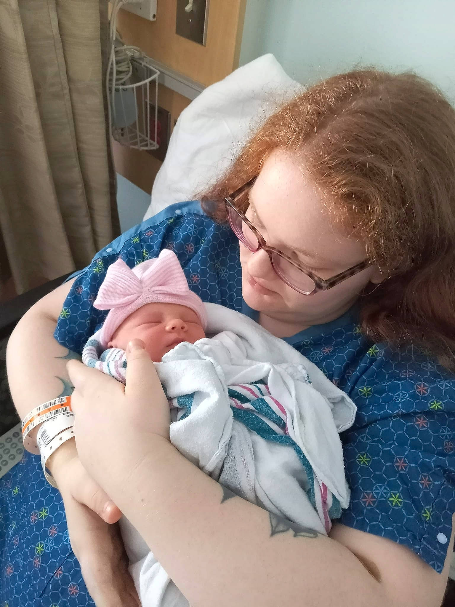 Lorraine is registered to the contest to win money with this photo: abdomen, arm, baby, baby_products, baby_toddler_clothing, chair, child, comfort, curtain, elbow, eyewear, glasses, health_care, houseplant, person, room, sitting, skin, toddler, vacation