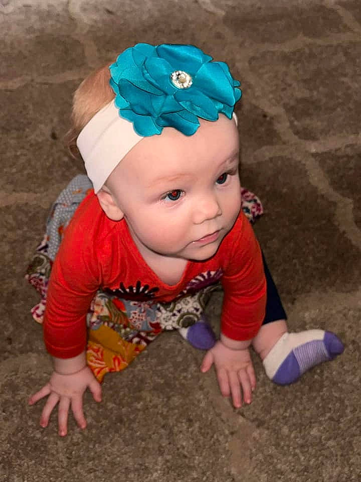 Lorraine joined the competition — help win amazing prizes! baby, baby_toddler_clothing, cap, child, costume_hat, electric_blue, eye, fashion_accessory, fun, grass, happy, hat, head, headband, headgear, headwear, pattern, person, sitting, sleeve