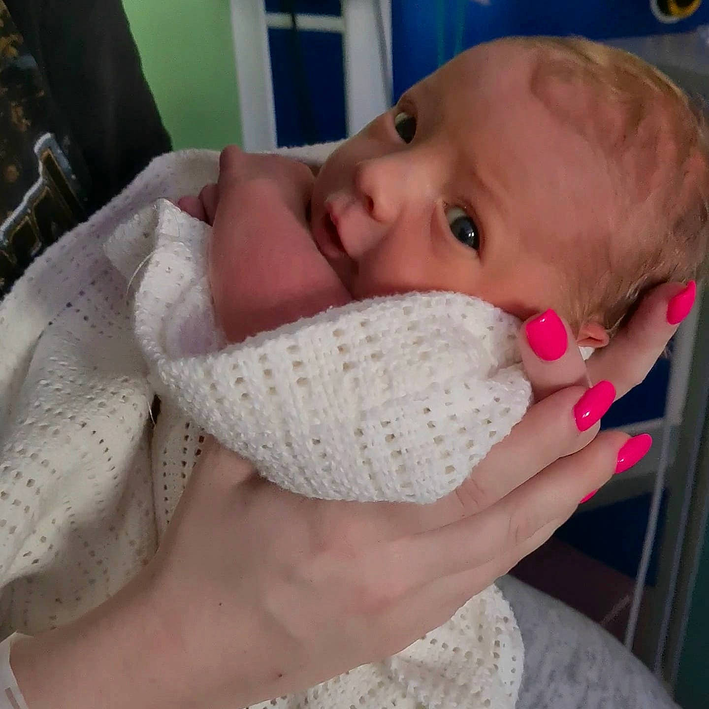 Zach is registered to the contest to win money with this photo: baby, baby_toddler_clothing, cheek, comfort, ear, eye, eyebrow, eyelash, finger, gesture, hand, human_body, iris, lip, mouth, neck, nose, person, skin, sleeve