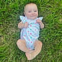 Klay-Cee joined the competition — help win amazing prizes! baby, infant, grass, outdoor, smiling, onesie, polka_dots, child, happy, barefoot, cute, nature, lying_down, skin, person, young, summer, playful, fresh_air, portrait