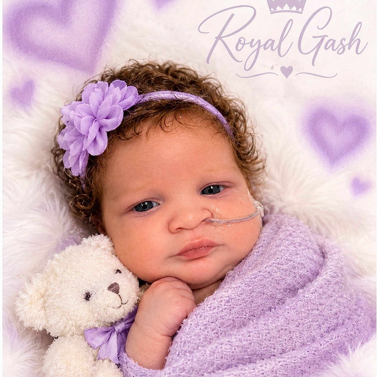 Royal joined the competition — help win amazing prizes! baby, blanket, child, curly_hair, eyes, face, flower_headband, indoor, infant, lavender, medical_device, nasal_tube, newborn, nursery, portrait, purple, royal_theme, sleeping_baby, stuffed_animal, teddy_bear