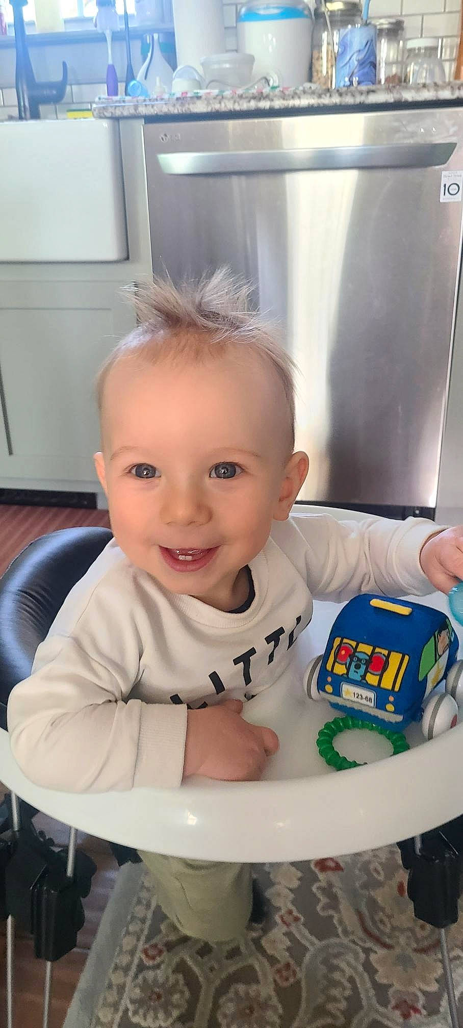 Dante joined the competition — help win amazing prizes! arm, baby, baby_products, baby_safety, baby_toddler_clothing, chair, cheek, child, flooring, fun, gas, happy, home_appliance, joy, person, play, room, sitting, smile, t_shirt