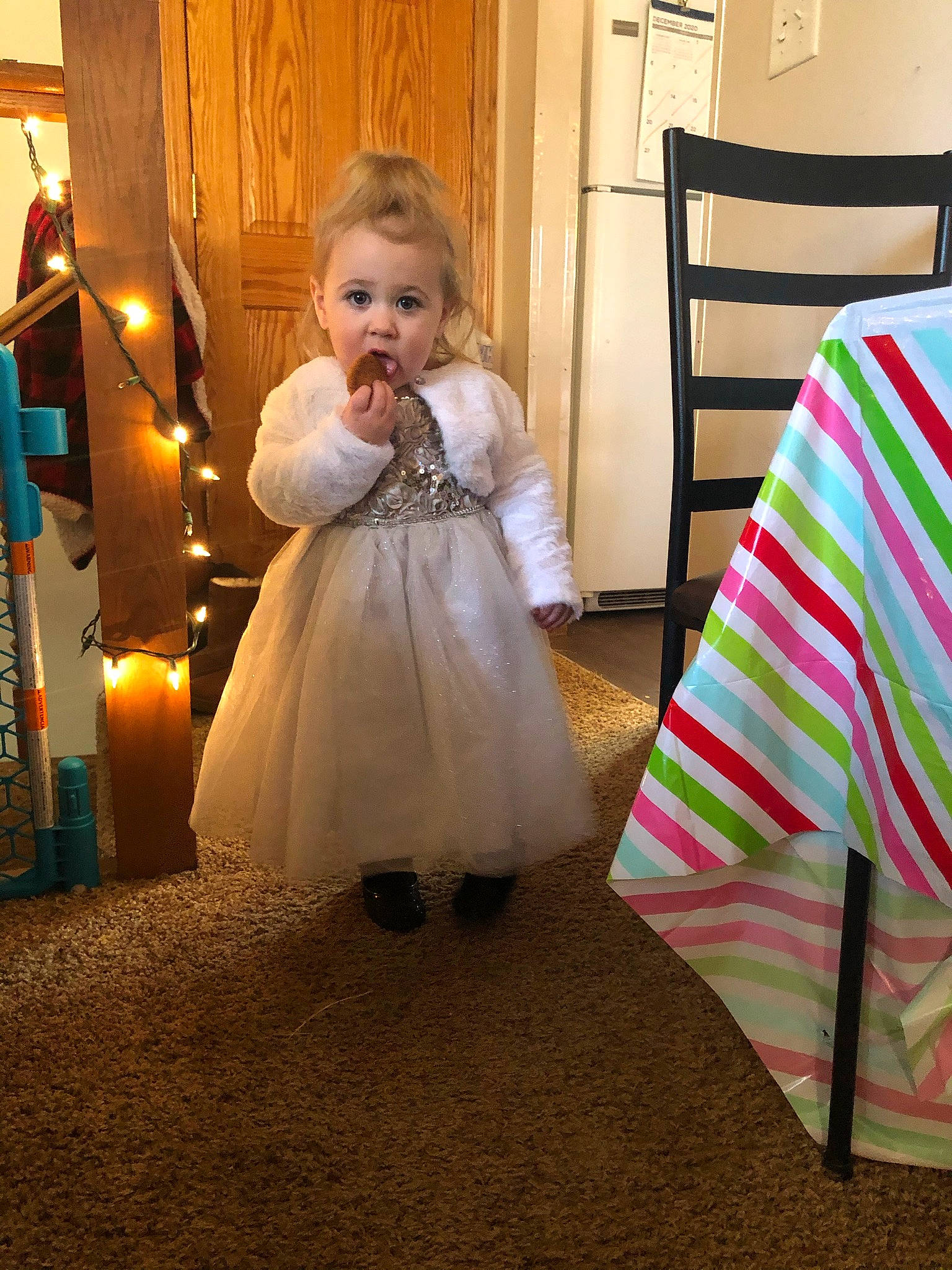 Charli joined the competition — help win amazing prizes! baby, baby_toddler_clothing, chair, child, dress, event, face, floor, flooring, formal_wear, fun, hairstyle, hardwood, linens, person, room, shoulder, sitting, surprise, tablecloth