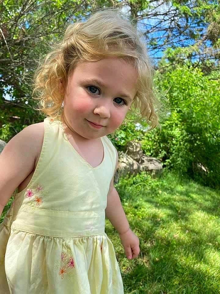 Charli joined the competition — help win amazing prizes! baby_toddler_clothing, blond, child, day_dress, dress, grass, grass_family, hair, hairstyle, happy, head, joy, one_piece_garment, pattern, people_in_nature, person, plant, sleeve, smile, toddler