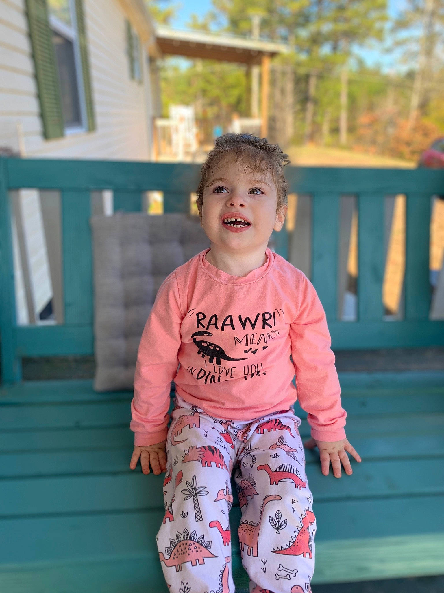Sera Jane joined the competition — help win amazing prizes! baby, baby_toddler_clothing, child, fun, grass, happy, house, leisure, pattern, peach, person, plant, recreation, sitting, sleeve, smile, standing, t_shirt, toddler, tree