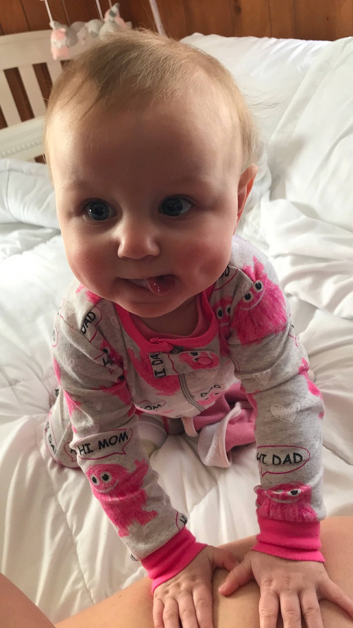 Kinsley is registered to the contest to win money with this photo: baby, baby_toddler_clothing, cheek, chin, comfort, eye, eyebrow, face, facial_expression, head, iris, lip, mouth, neck, nose, person, pink, skin, sleeve, smile