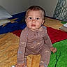 Azriel joined the competition — help win amazing prizes! baby, infant, child, sitting, portrait, face, eyes, looking_at_camera, indoors, bedroom, bed, blanket, colorful, clothing, pajamas, striped_socks, smiling, cozy, home, photograph