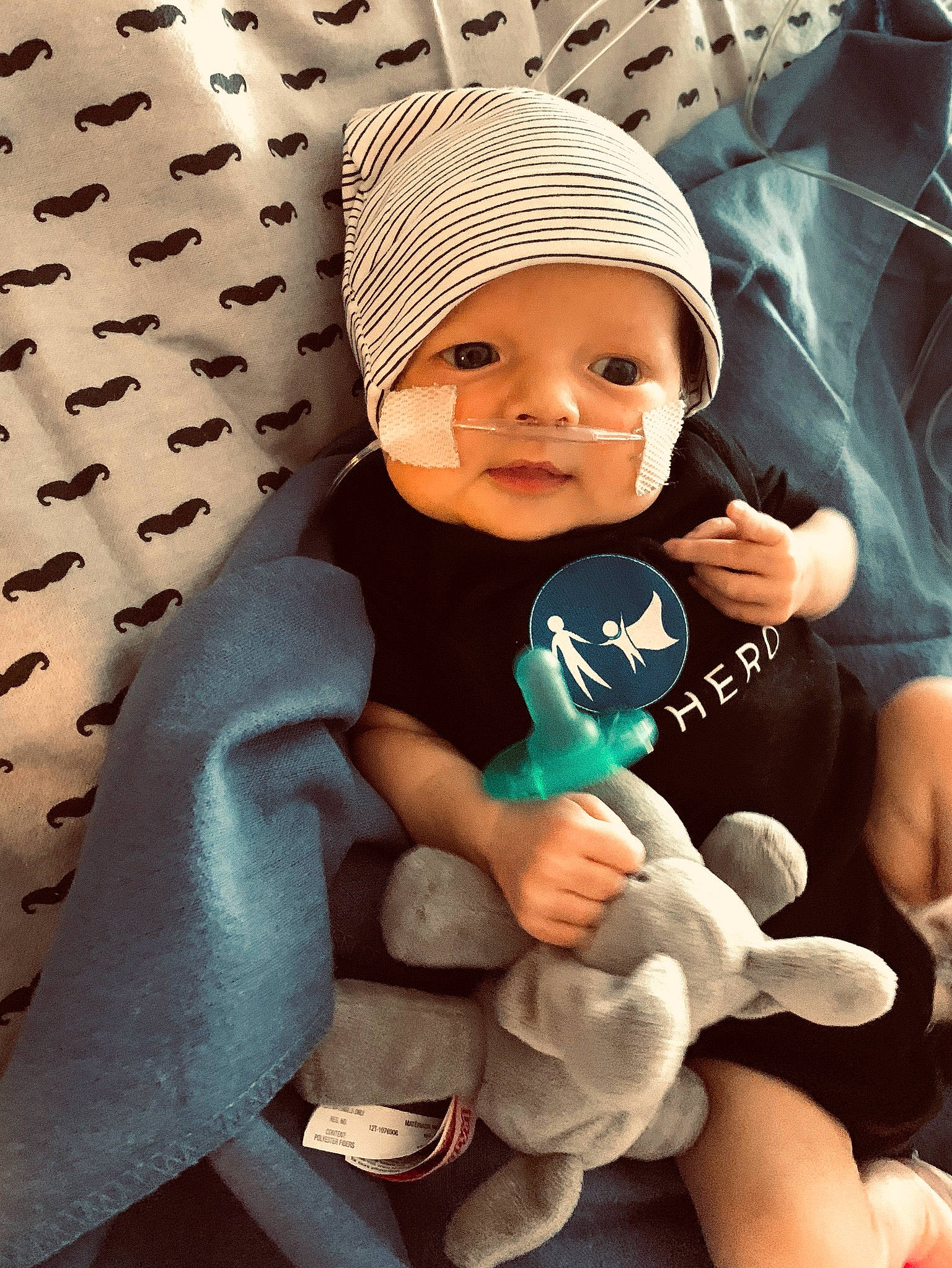 Navy is registered to the contest to win money with this photo: baby, bonnet, child, headgear, headwear, person, skin, smile, toddler