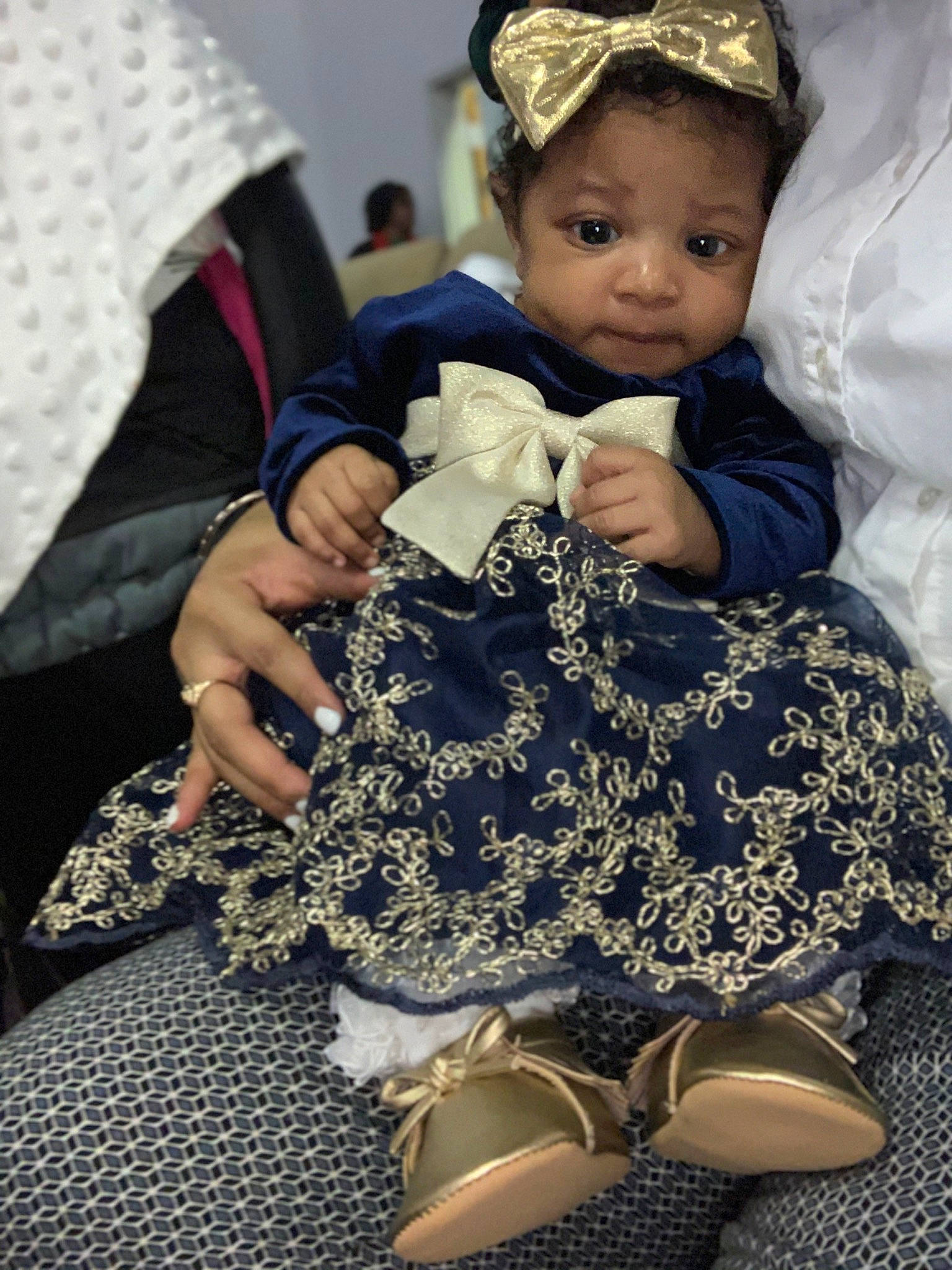 Rayne is registered to the contest to win money with this photo: baby, child, doll, headgear, person, shoe, sitting, toddler