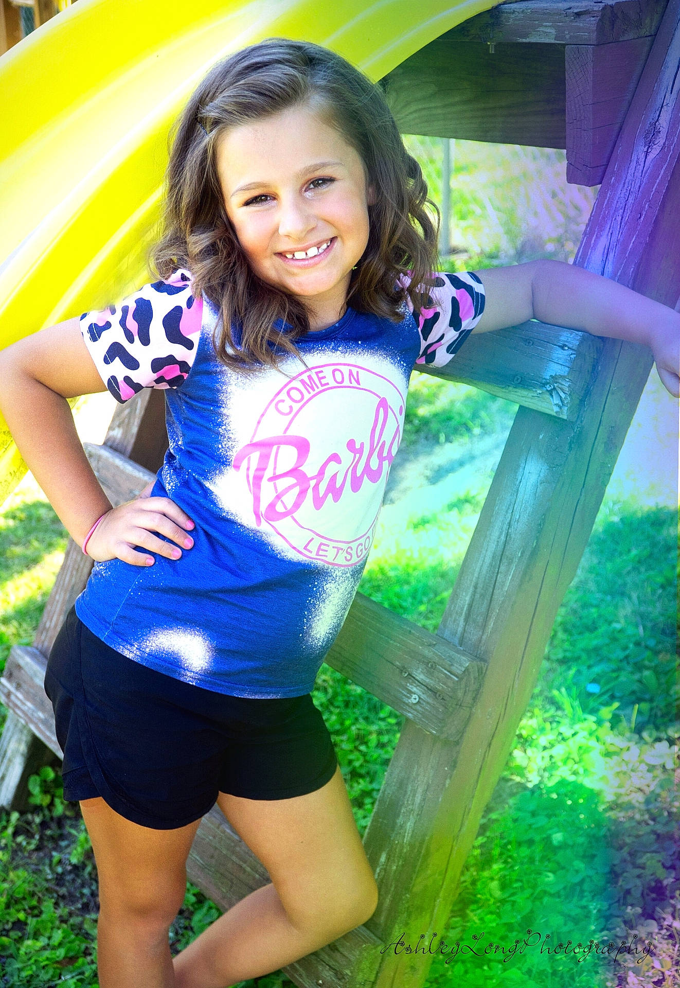 Priscilla is registered to the contest to win money with this photo: blouse, child, clothing, dress, face, female, girl, grass, happy, head, outdoors, person, photography, plant, playarea, portrait, shorts, smile, summer, t_shirt