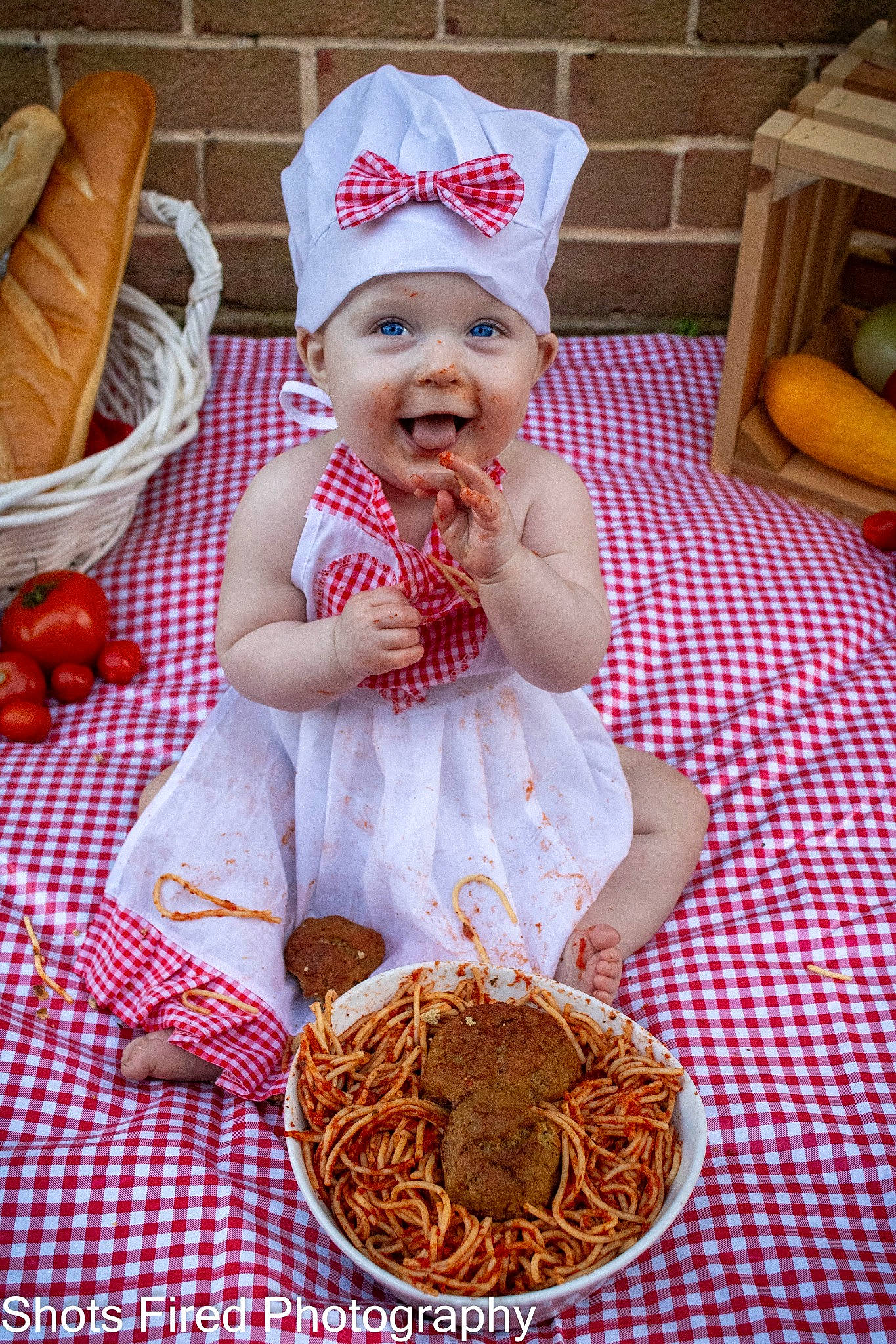 Kaitlin is registered to the contest to win money with this photo: baby, baby_toddler_clothing, basket, birthday, cap, child, cuisine, dish, event, food, happy, hat, head, headwear, holiday, joy, natural_foods, person, santa_claus, smile