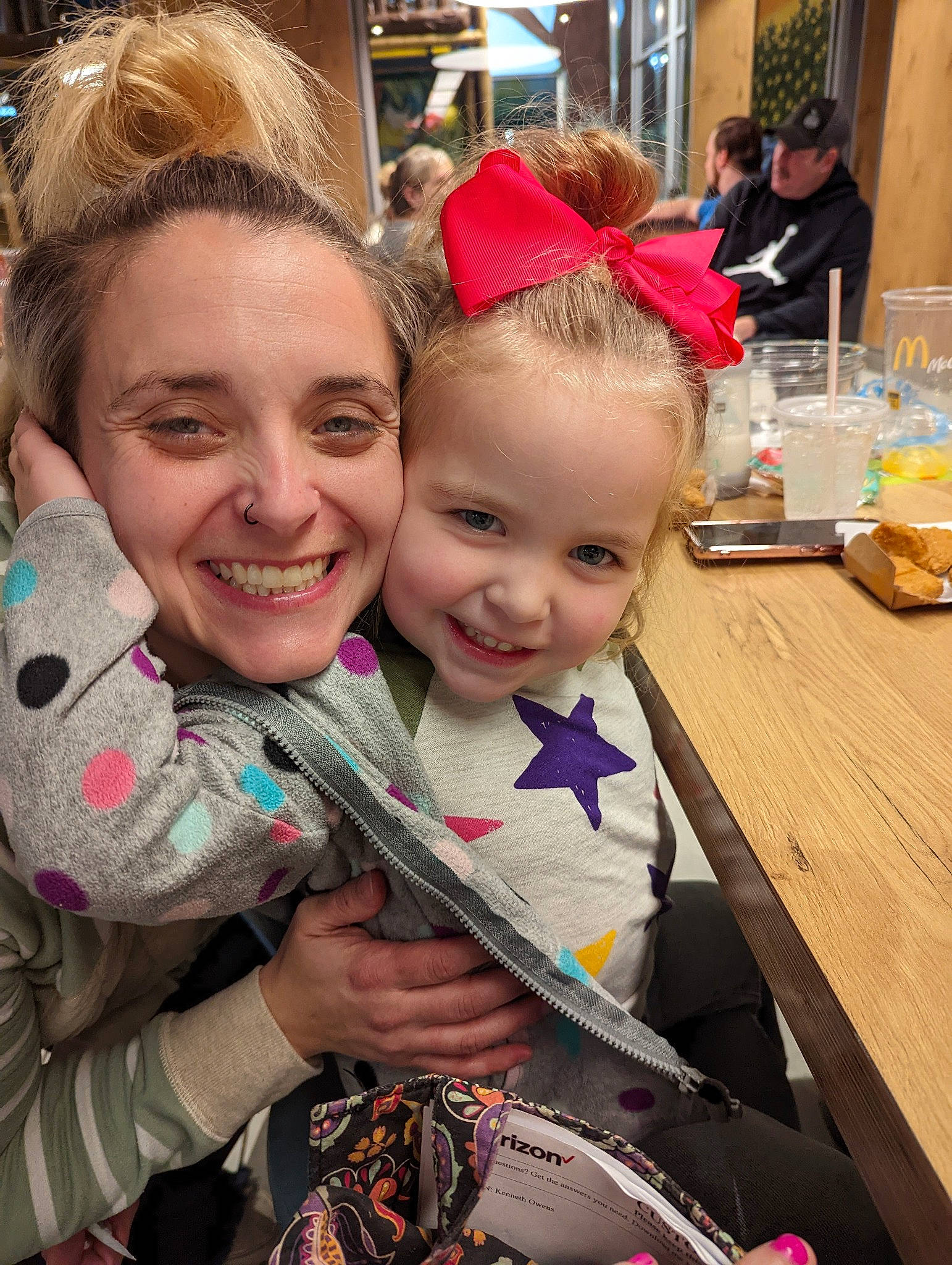 Evie joined the competition — help win amazing prizes! blond, chair, child, event, eyewear, facial_expression, fun, hair, happy, headwear, hug, iris, jewellery, joy, leisure, person, recreation, skin, smile, table