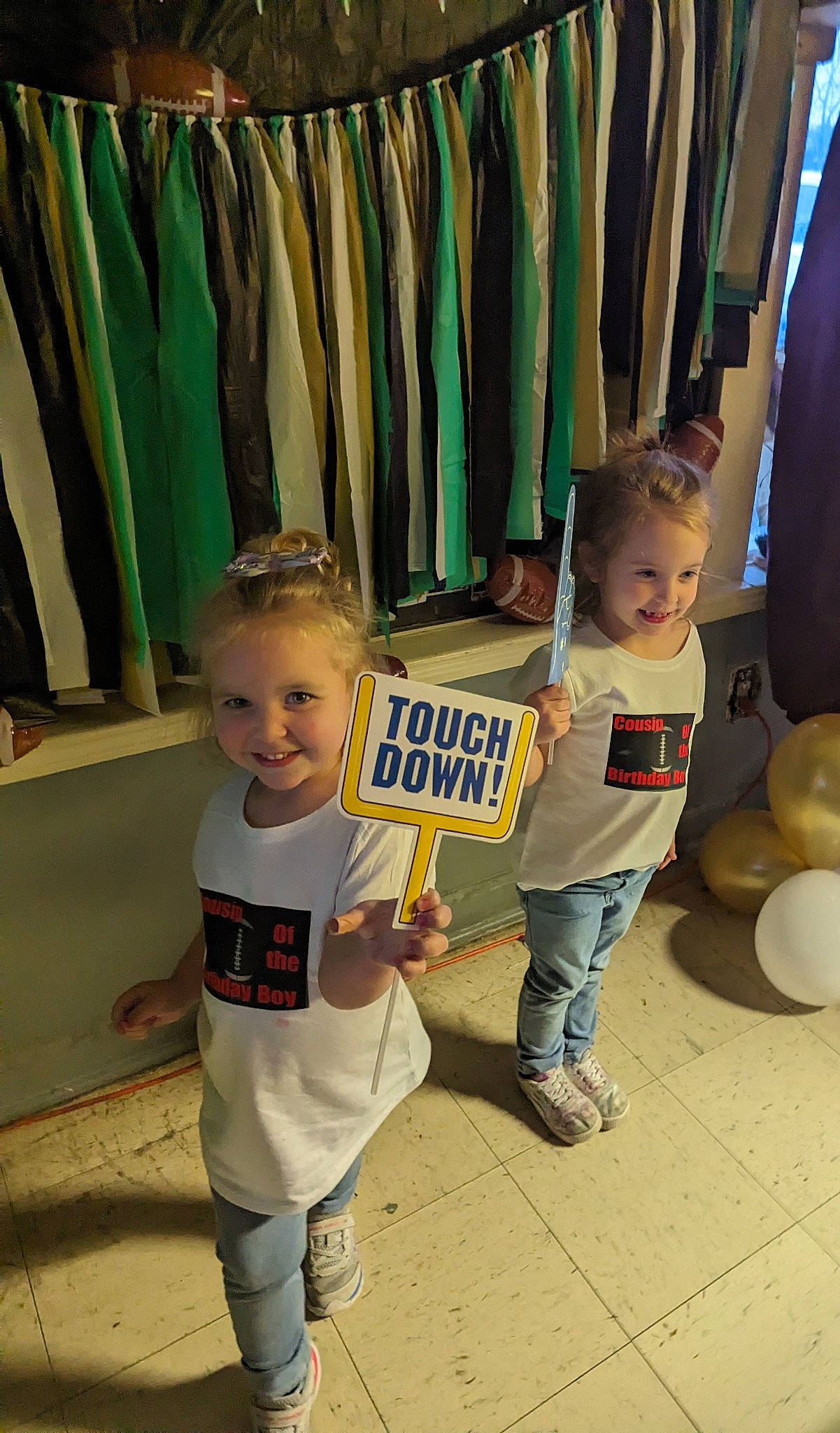 Evie joined the competition — help win amazing prizes! baby_toddler_clothing, child, closet, clothes_hanger, fashion_design, floor, flooring, fun, happy, hat, joy, logo, person, room, sleeve, smile, snapshot, t_shirt, textile, toddler