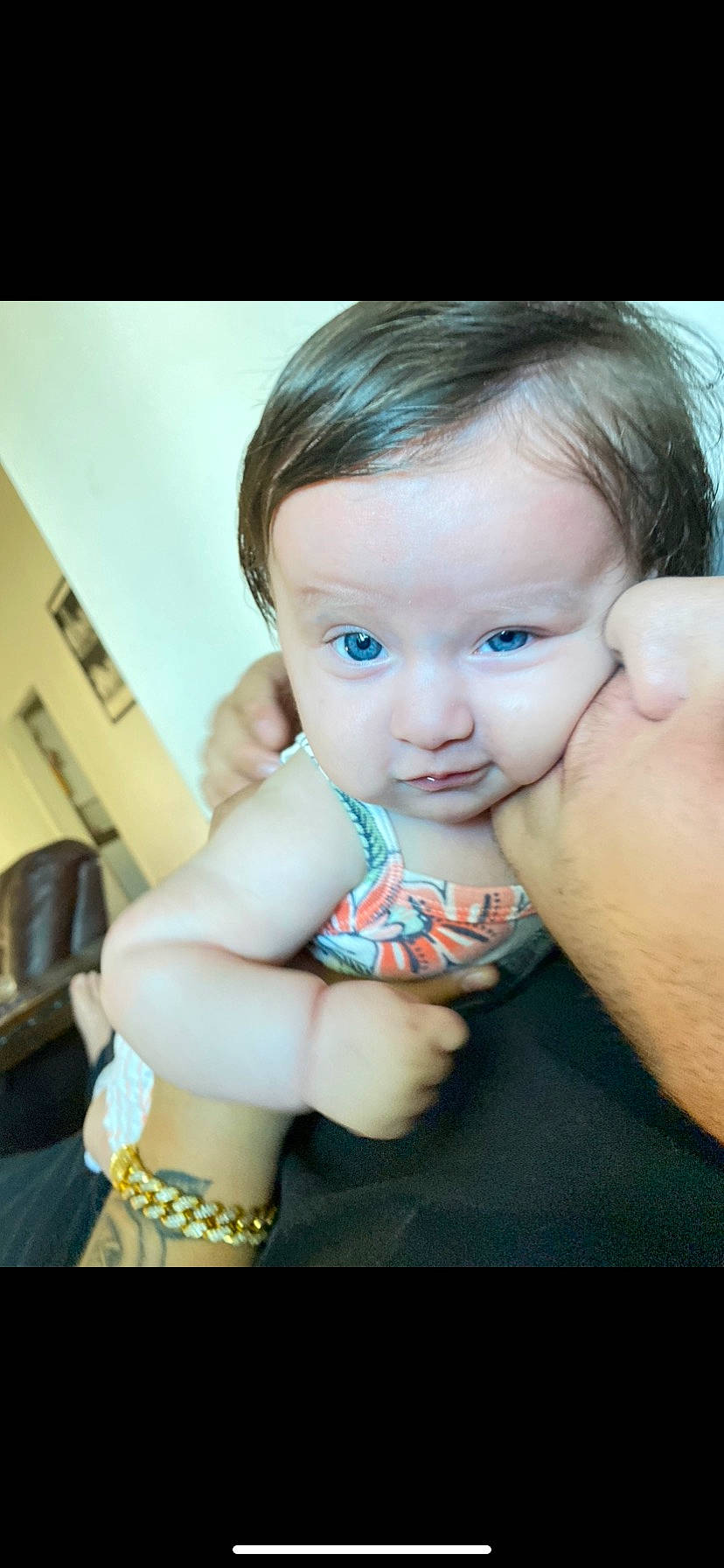 Rosalie is registered to the contest to win money with this photo: baby, baby_toddler_clothing, cheek, eyelash, finger, flash_photography, gesture, hand, happy, iris, lip, mouth, nail, neck, nose, person, plant, skin, thumb, toddler