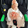 baby, newborn, infant, car_seat, flower, headband, white_clothing, booties, sleeping, cute, adorable, peaceful, infant_clothing, baby_girl, seat_belt, fabric, lace, tulle, indoor, soft_lighting