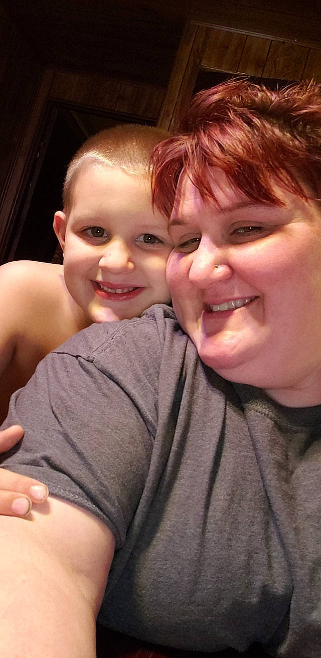 Gage is registered to the contest to win money with this photo: cheek, child, chin, daughter, face, facial_expression, forehead, fun, gesture, happy, hug, interaction, joy, lip, love, mother, nose, person, skin, smile