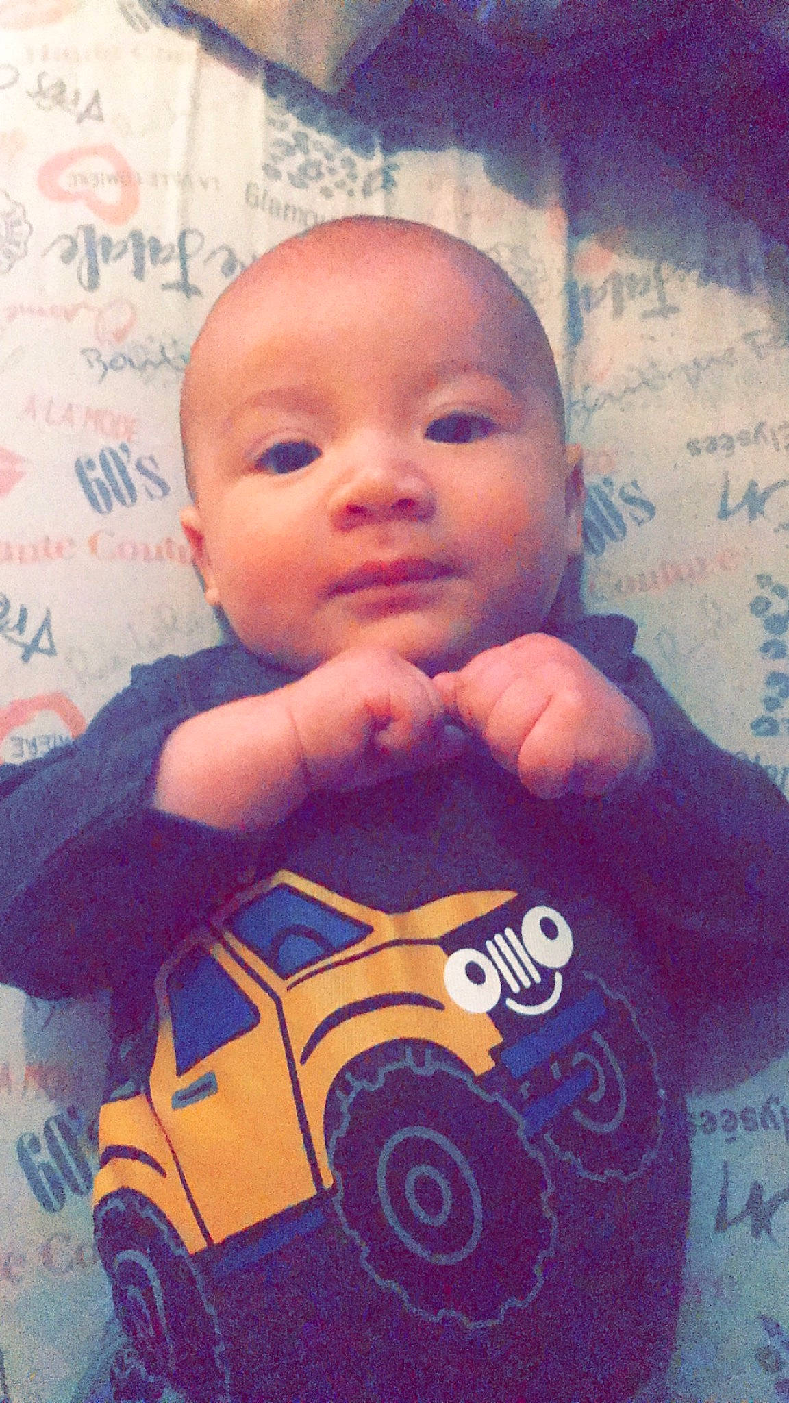 Chad joined the competition — help win amazing prizes! baby, baby_toddler_clothing, cheek, chin, facial_expression, finger, forehead, hairstyle, happy, lip, mouth, nose, person, pink, product, riding_toy, skin, sleeve, tire, toddler