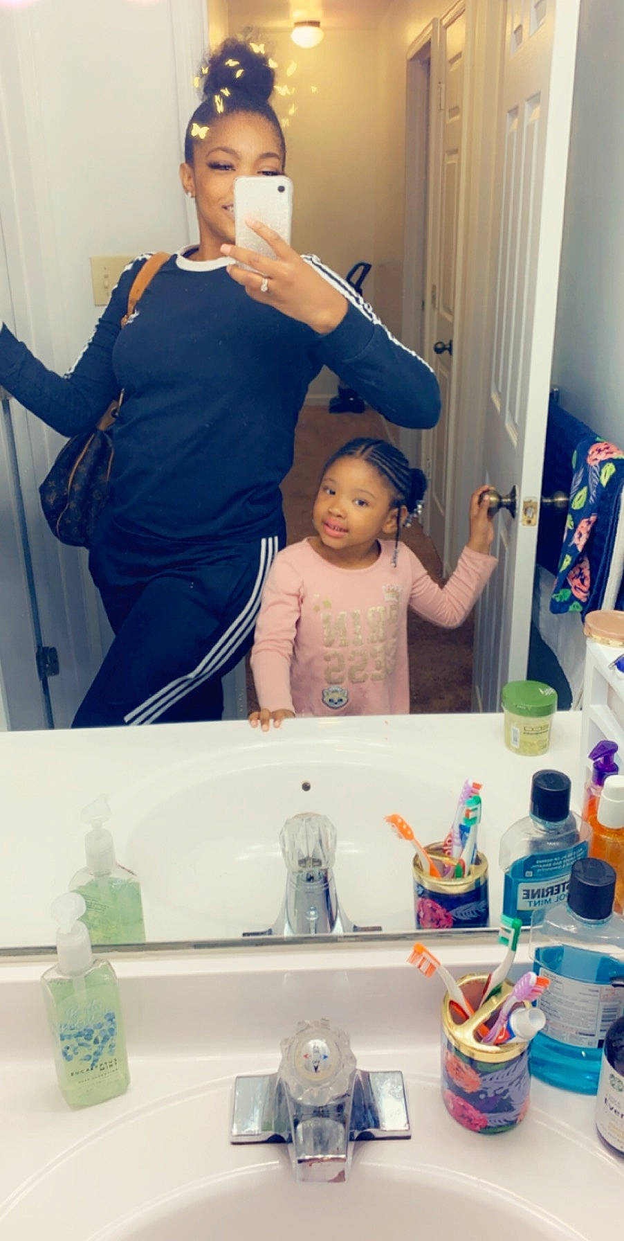 Kya is registered to the contest to win money with this photo: bathing, bathroom, child, hair_care, hair_coloring, person, plastic_bottle, room, selfie, skin, tooth_brushing, toothbrush