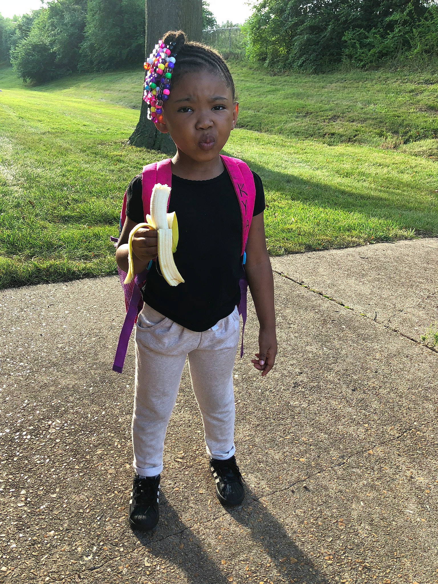 Kya is registered to the contest to win money with this photo: child, fun, grass, happy, person, plant, play, smile, style, summer, t_shirt, toddler, tree, vacation, walking