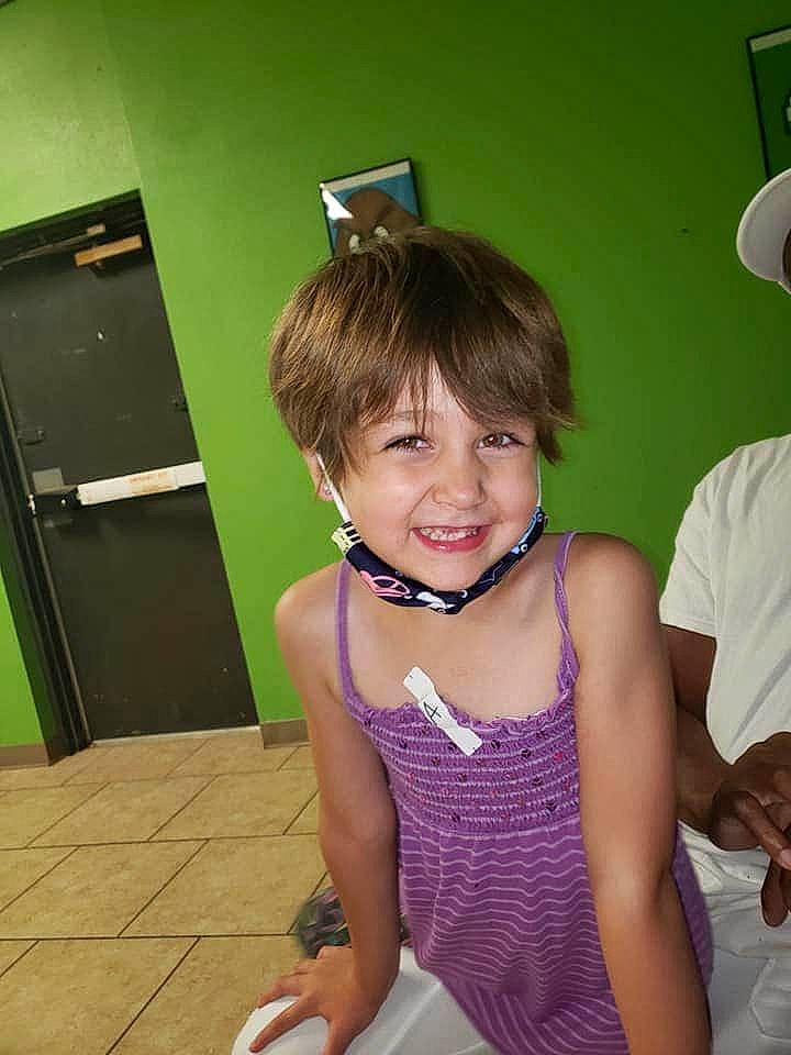 Adalyn is registered to the contest to win money with this photo: arm, bangs, child, fun, joy, neck, person, room, smile