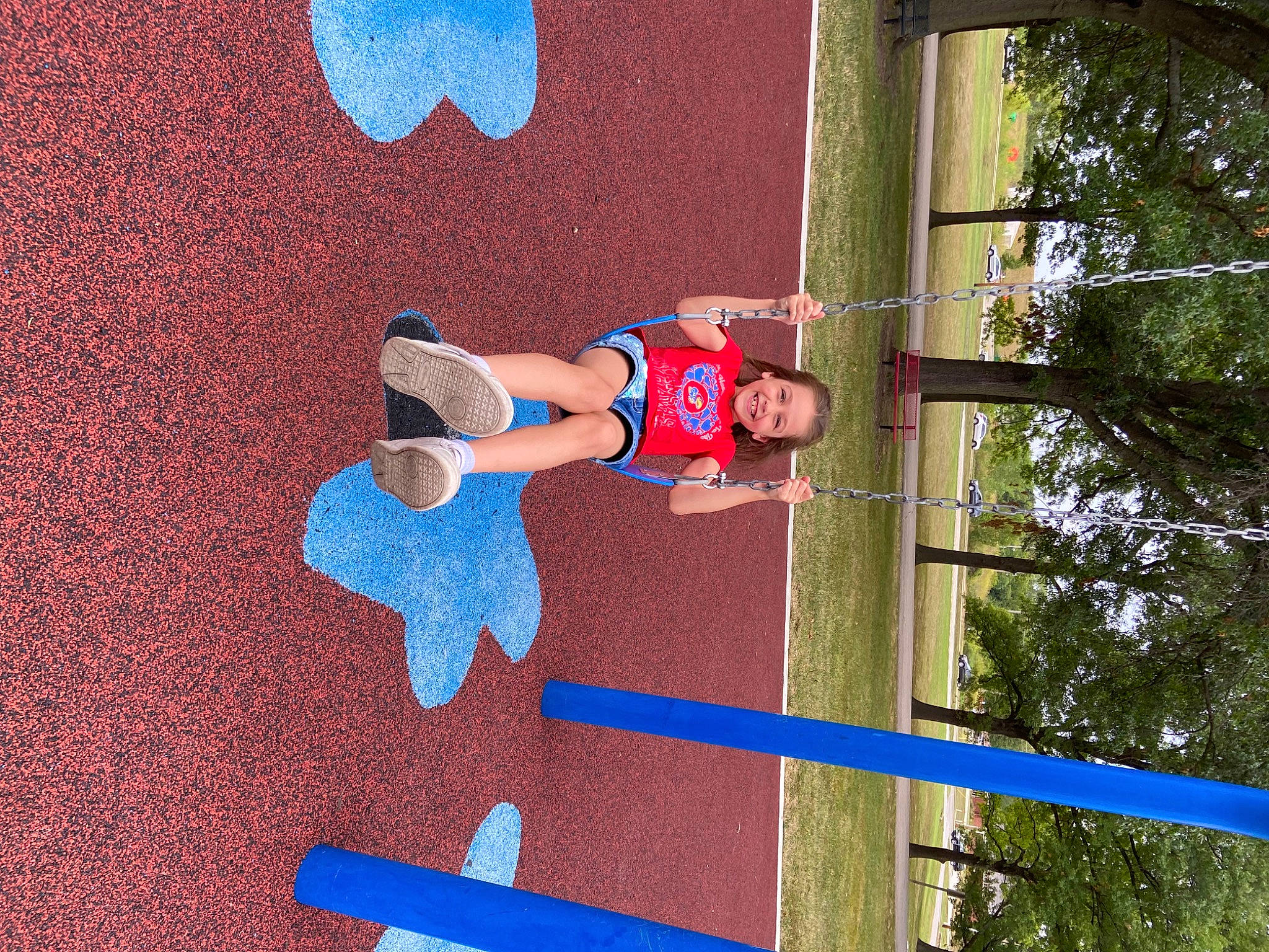 Adalyn is registered to the contest to win money with this photo: blue, carmine, child, city, elbow, electric_blue, fun, joy, leisure, line, paint, person, recreation, red, sky, smile, t_shirt, thigh, toddler, tree