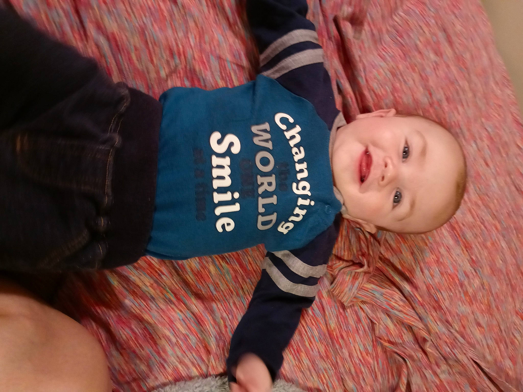 Corbin is registered to the contest to win money with this photo: baby, baby_toddler_clothing, cap, child, comfort, finger, happy, hat, headgear, human_body, iris, lip, nail, person, skin, sleeve, smile, thigh, toddler, wood