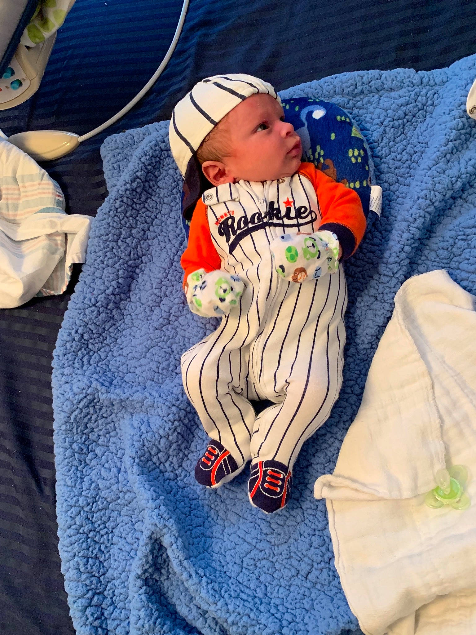 Aron is registered to the contest to win money with this photo: blue, cap, child, fun, headgear, headwear, infant, material, outerwear, person, play, product, textile, toddler