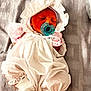 Delilah joined the competition — help win amazing prizes! baby, newborn, pacifier, bonnet, white_dress, sleeping, socks, pink_mittens, blanket, infant, portrait, cozy, soft_texture, laying_down, closed_eyes, nursery, fabric, tiny_feet, peaceful, cute